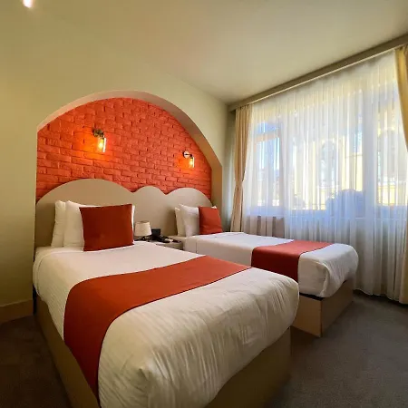 By Kinyas Hotel *